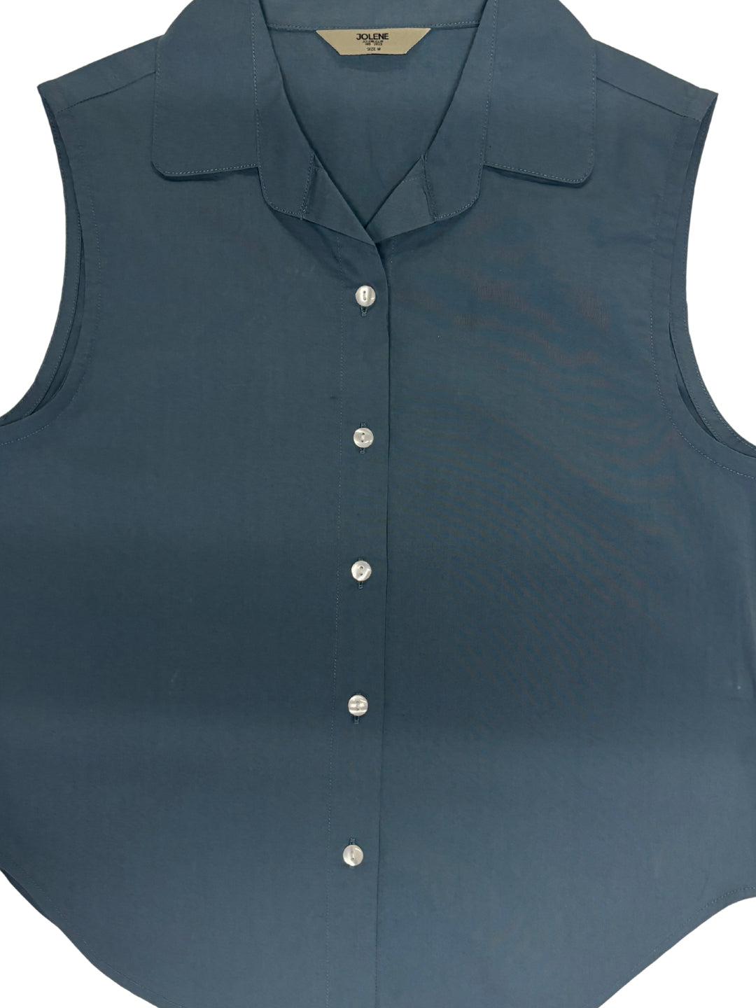 Blue grey cotton sleeveless cropped shirt with round collar, front button placket and curved hem – Jolene